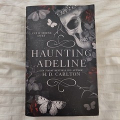 Haunting Adeline By H. D. Carlton. Paperback. ISBN # 9781638932468.